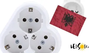 Białe gniazdka elektryczne z flagą Albanii. Idealne do podłączenia urządzeń w każdym domu.