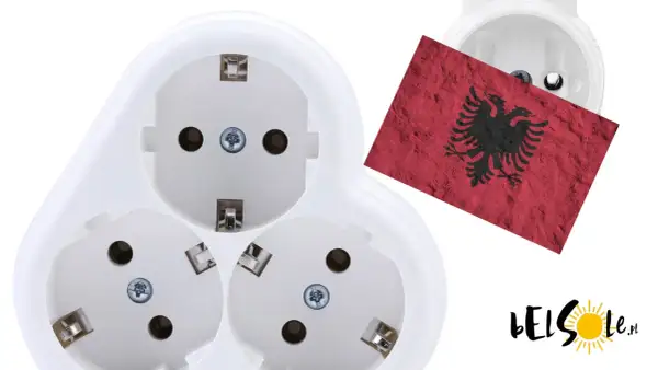 Białe gniazdka elektryczne z flagą Albanii. Idealne do podłączenia urządzeń w każdym domu.